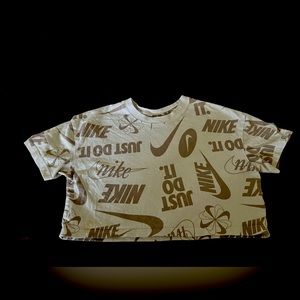 Brown &’ white Nike crop top.
